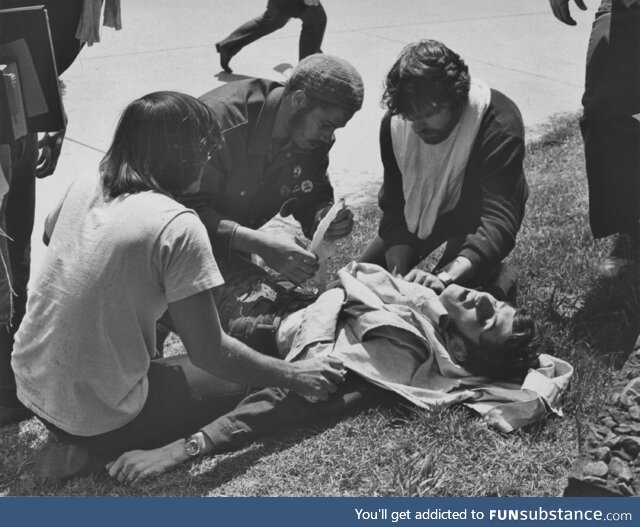 Ohio National Guard open fire on peaceful prostesters kill 4 at Kent State May 4th 1970