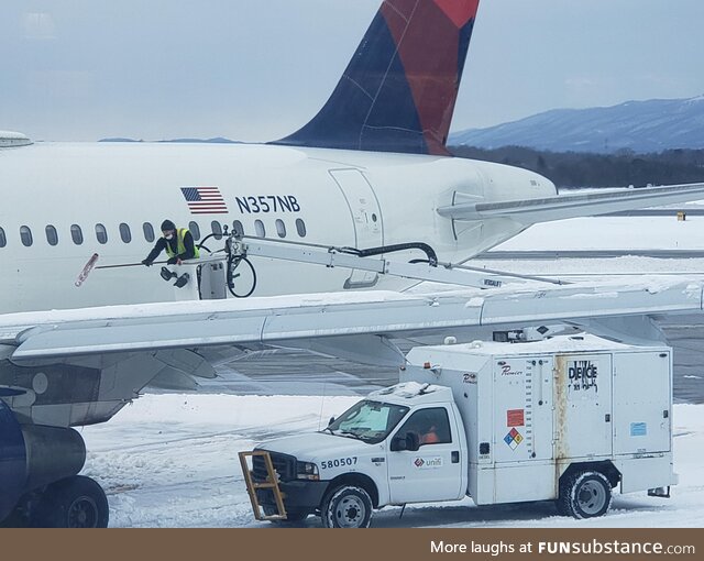 When the de icer at your airport breaks so you replace it with ...... A GUY WITH A BIG