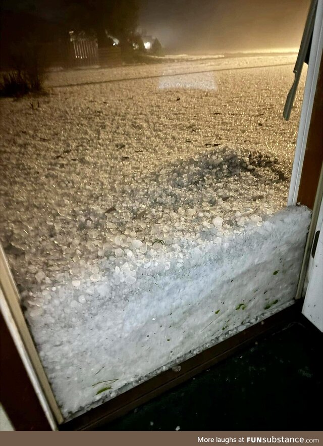 This is not snow. It's a hail build up near a door in Eastern Colorado from storms last