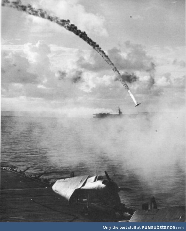 Japanese plane shot down during the battle of Saipan . 1944