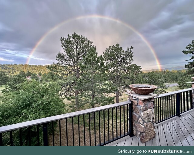 John Oliver took this photo of a half circle rainbow in Colorado