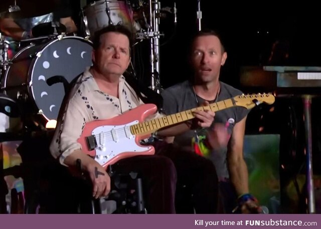 Michael J Fox joins Coldplay on stage at Glastonbury