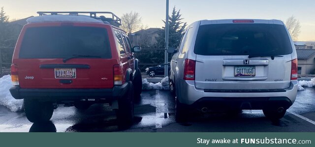 Parked by chance next to each other at a fast food business