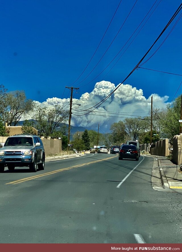 [OC] the Calf Canyon/Hermit’s Peak fire looming over downtown Santa Fe NM today