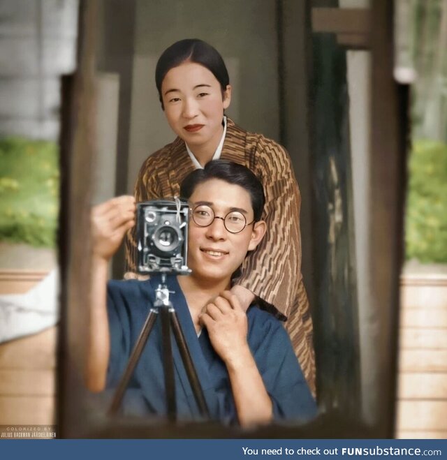 A Japanese couple taking a self portrait together in 1920