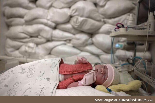 Sand-bagged room protecting babies from russian missiles at a children's hospital in Kyiv