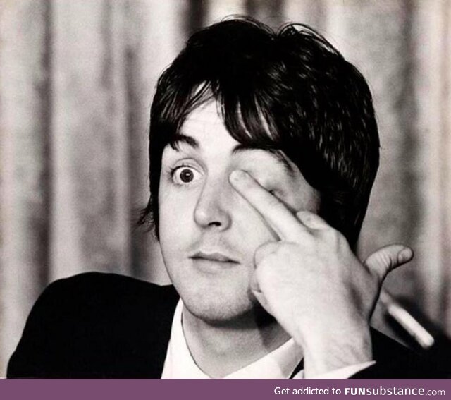 Paul McCartney giving the bird during press conferences at the Americana Hotel, May 14,