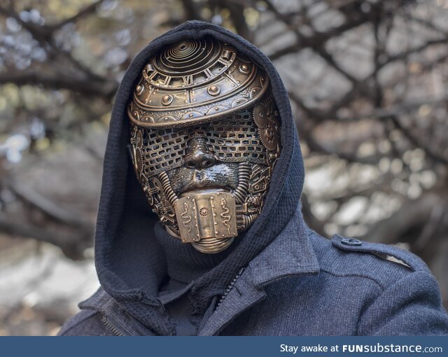 Parts of children's toys, gears from table clocks were used to decorate this mask