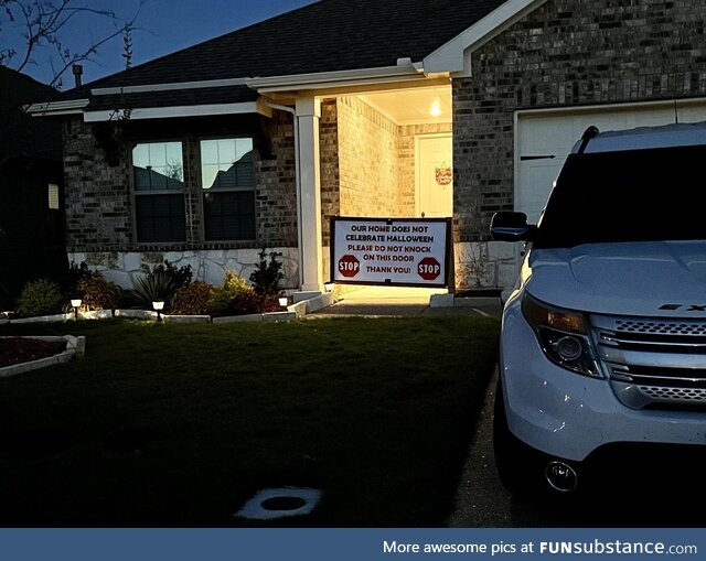 Our neighbor bought this giant sign instead of turning the light off