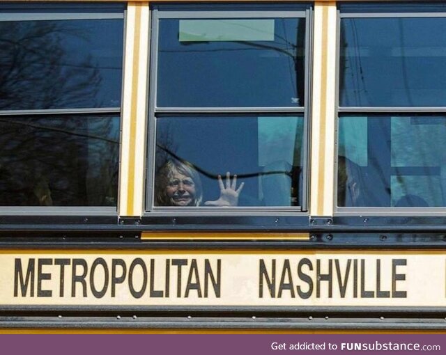 Deeply distressed elementary school student being transported by bus following school