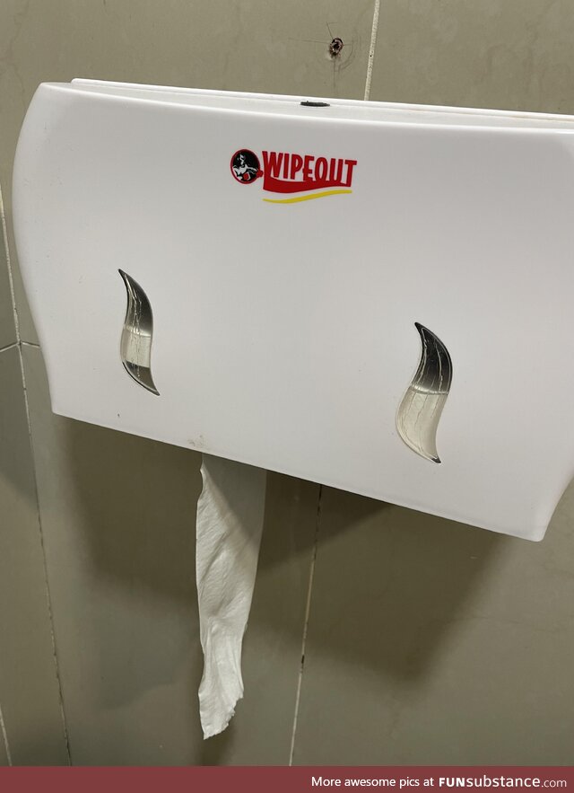 Manufacturer’s name doubles as instructions on a toilet roll dispenser