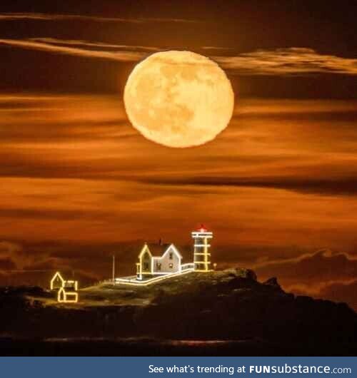 December moon over lighthouse