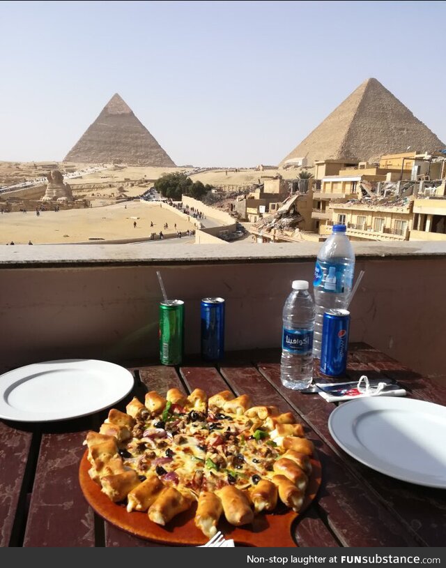 Pyramids of Giza as seen from a nearby Pizza Hut a quarter mile away