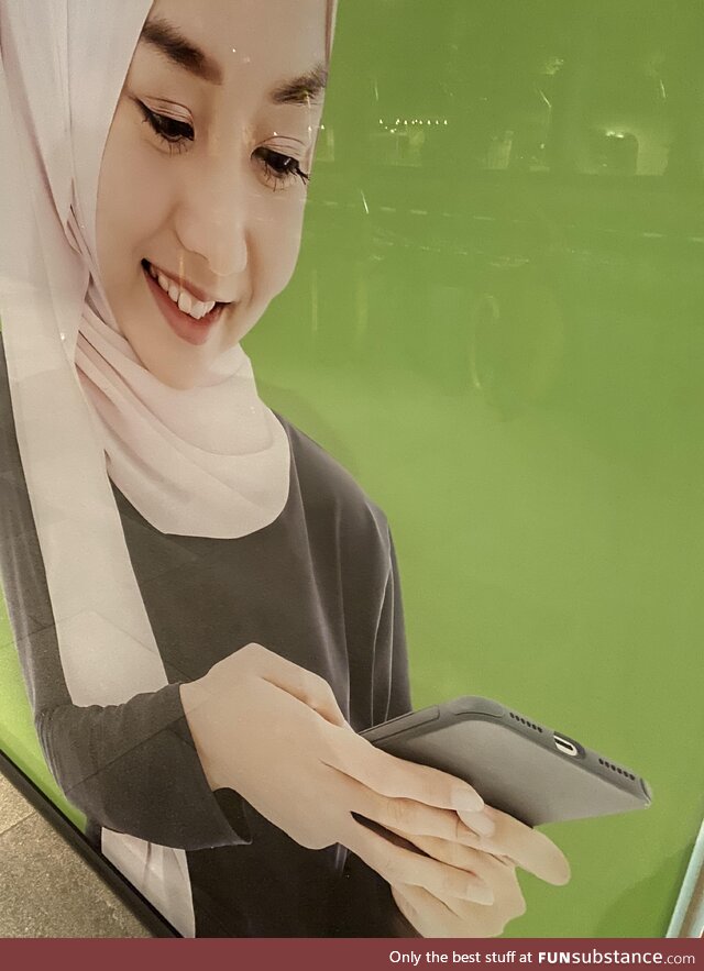 Walked past this image for years and only just noticed that she’s using the phone