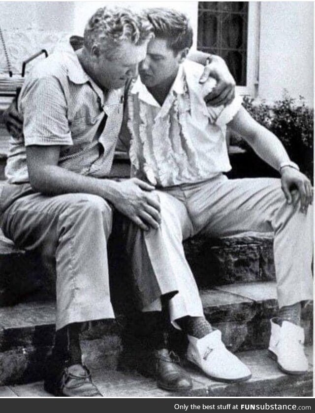 Elvis Presley comforting his father upon the passing of his (Elvis) mother in 1958