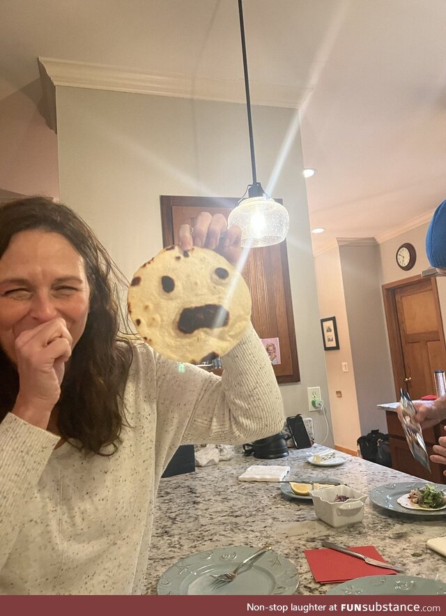 We accidentally burnt a tortilla and it looks horrified