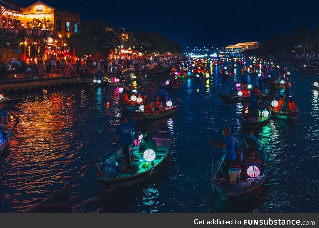 Vietnamese night river boating