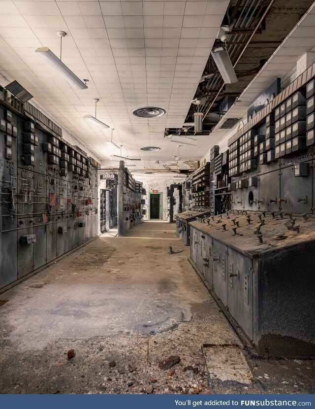 Abandoned 1920’s power plant control room[OC]