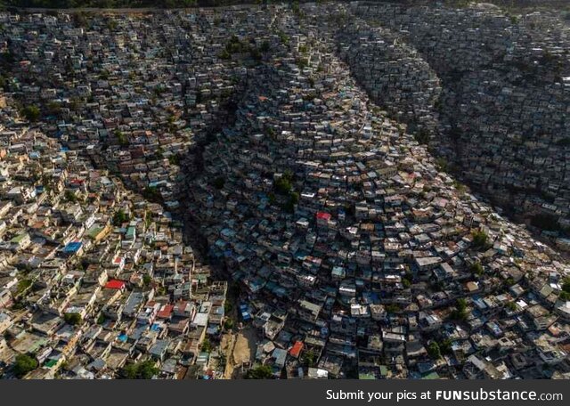 Houses sit on the slopes of the Jalousie neighborhood in Port-au-Prince, Haiti