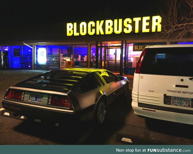 Delorean at Blockbuster, maybe renting something with john Oliver