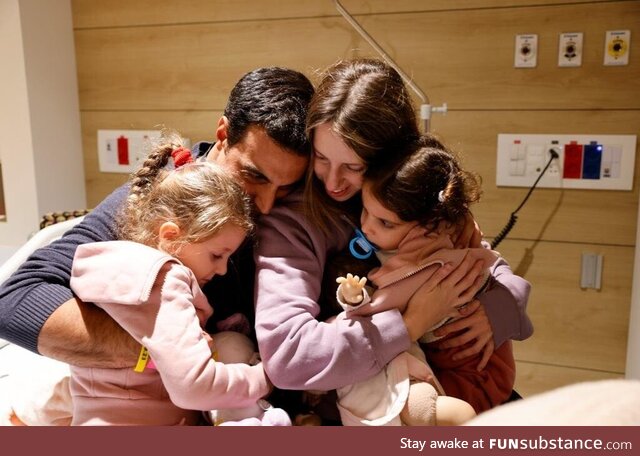 Man reunites with his wife and two young daughters, the three were captive by terrorists