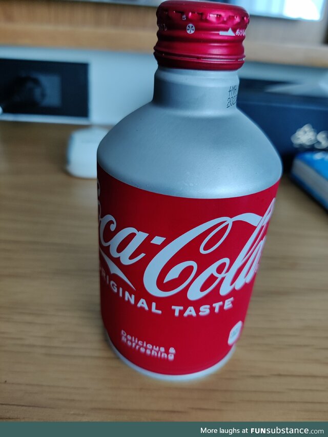 Weird looking japanese Coca Cola can