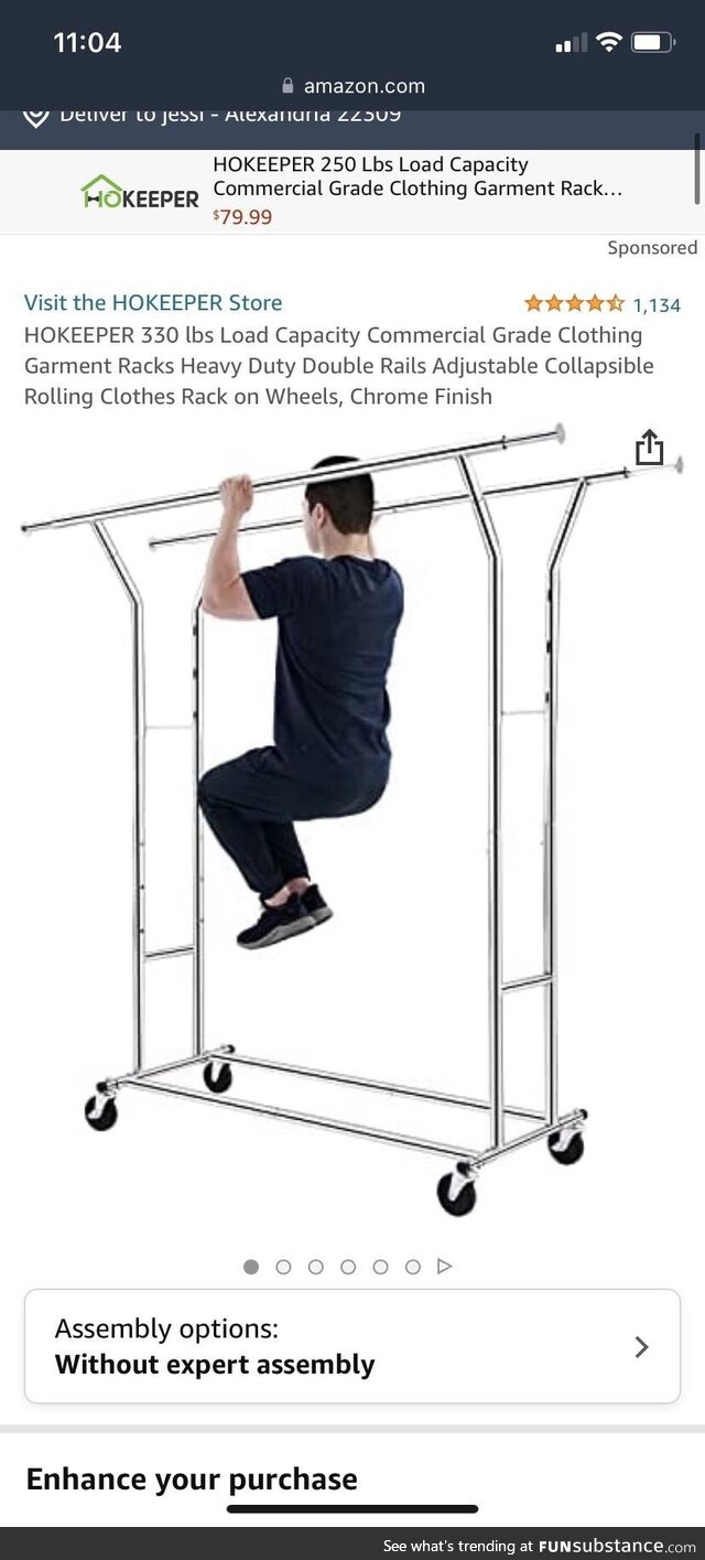 Such an interesting choice of picture to market a garment rack. Is he doing pull ups?