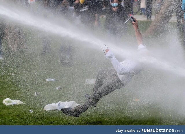 Man protesting Covid restrictions in Belgium hit by water cannon