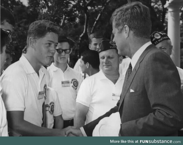 John Kennedy shaking hands with future president Bill Clinton, 1963