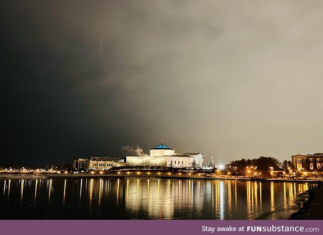 Beautiful reflecting lights. Frozen Lake Michigan. Late night Chicago. Shedd Aquarium