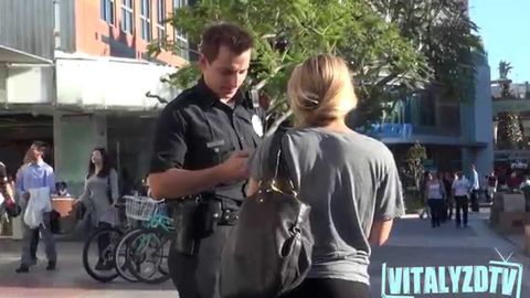 Picking up girls while dressed up as a police officer