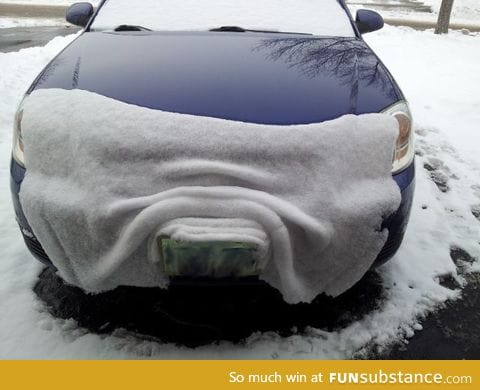 Snow slipping off of a car's hood