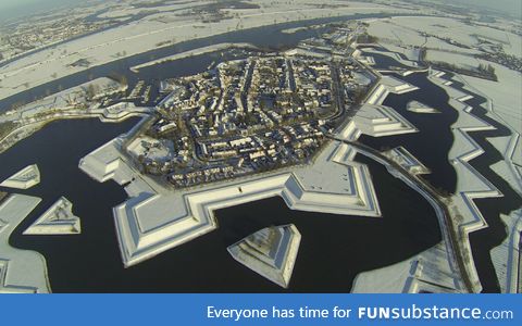 Beautiful village in the Netherlands covered in snow