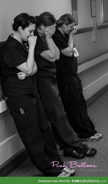 Nurses after a patient suffers a miscarriage