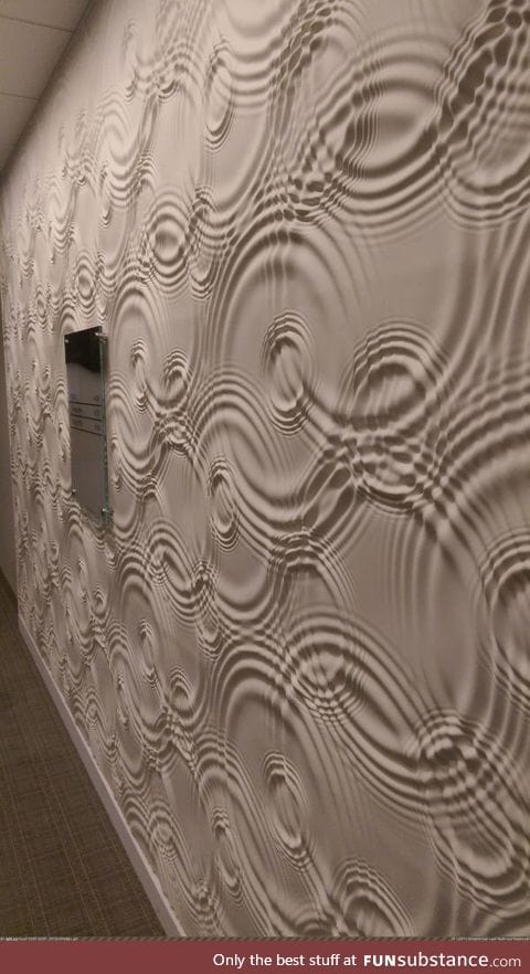 The texture on this wall looks like rippling liquid