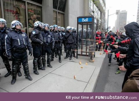 Protesters taunting police with donuts