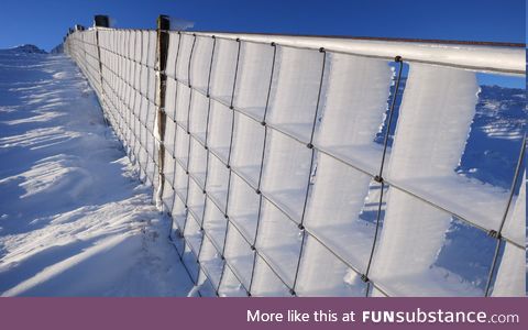 Ice driven through a fence