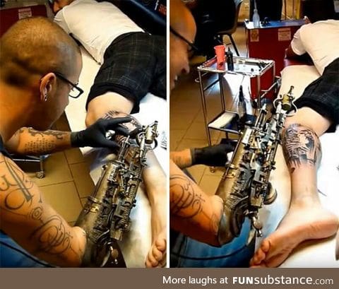 Artist with prosthetic arm turns his arm into a badass tattoo machine