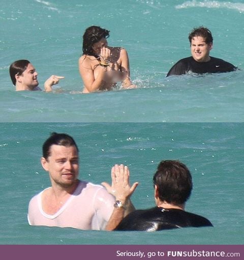 Leonardo DiCaprio and Jonah Hill swimming in the ocean