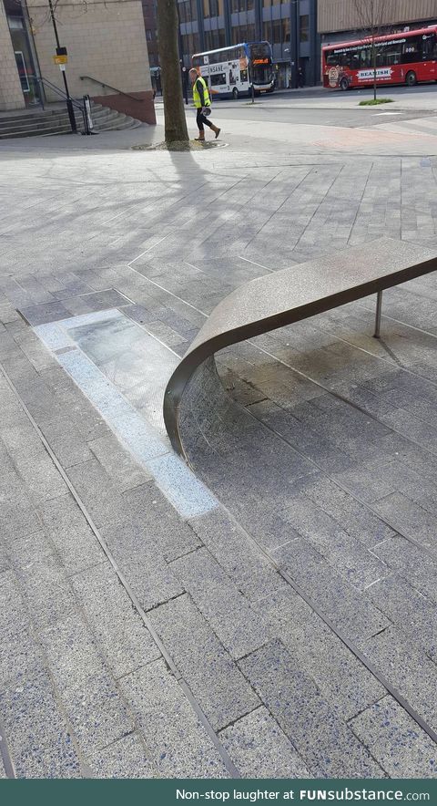 This bench is made from a curled-up paving stone