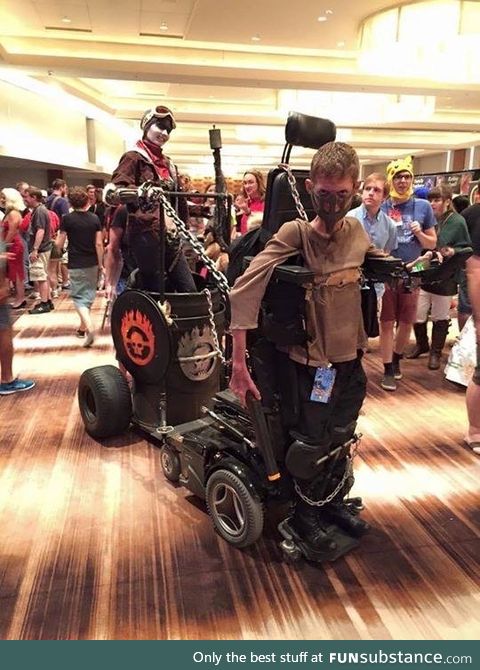 Kid with disability uses it to his advantage as a mad max cosplay