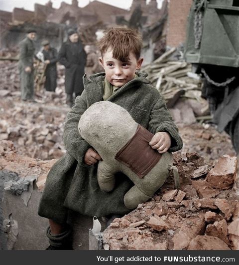 Colorised photo of an Abandoned Boy Holding a Stuffed Toy Animal. London 1945