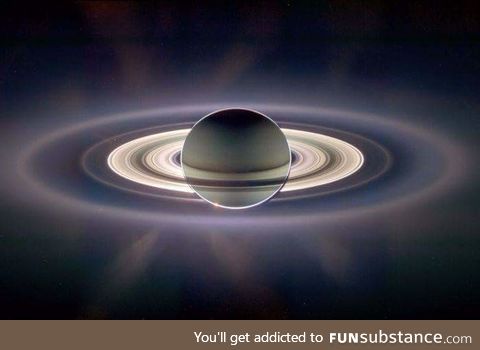 Saturn eclipsing the sun. Image: Cassini