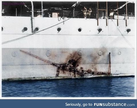 The imprint of a kamikaze Mitsubishi Ki-51 on the side of H.M.S Sussex in 1945