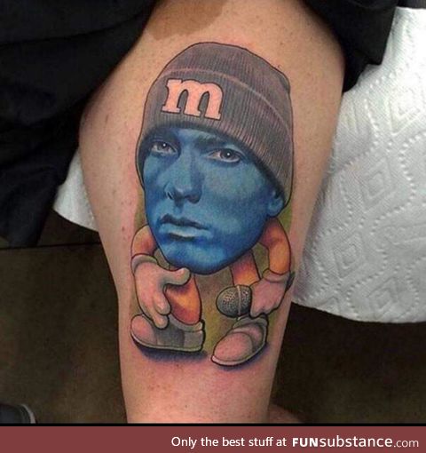 When you can't choose between the Eminem tattoo and the M&M tattoo so you opt for: