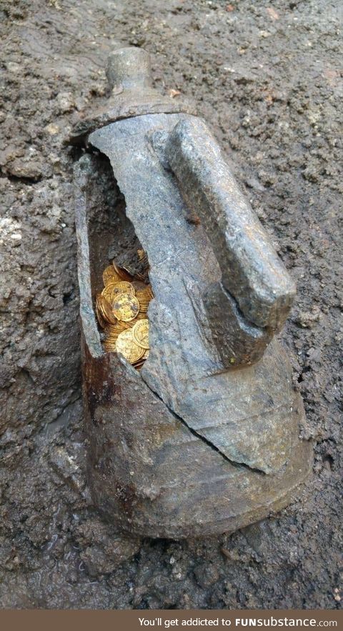 An amphora containing hundreds of 5th-century gold coins