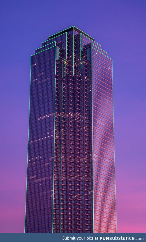 The sun setting on Bank of America Plaza tonight