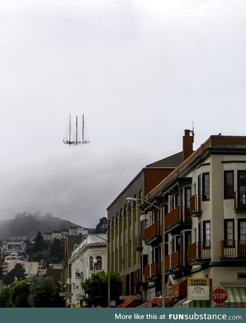 This picture in San Francisco looks like a ship floating on the clouds