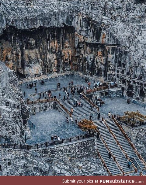 The Longman caves (China), huge Buddhas carved into rock walls