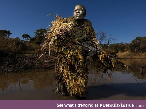 A member of an all-female anti-poaching unit called Akashinga ("The Valiants")